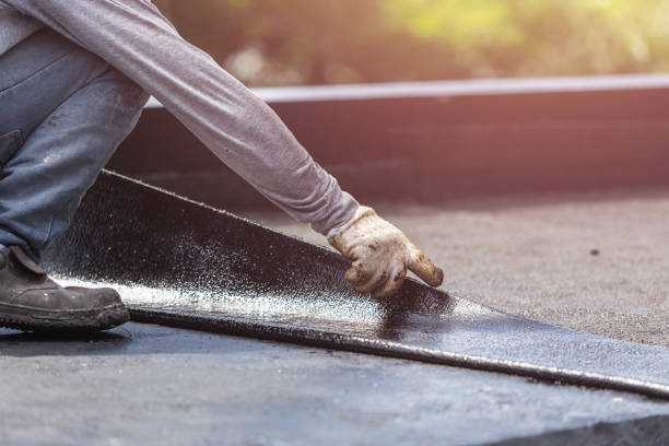 Professional Waterproofing technician working in Ray, MI